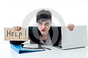 Attractive young overwhelmed and frustrated business woman worki