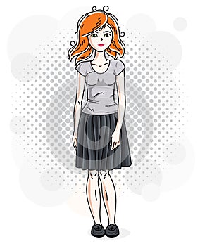 Attractive young red-haired woman standing on modern background