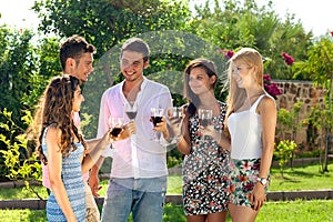 Attractive young teenagers partying outdoors