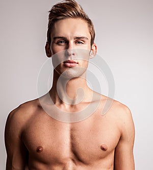 Attractive young undressed man model.