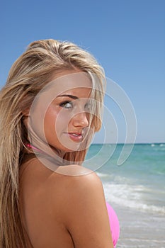 Attractive young woman on a beach