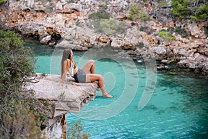 Attractive young woman on the beach of Majorca Spain