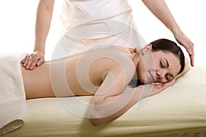 Attractive young woman being massaged