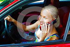 Attractive young woman calling by cellular phone