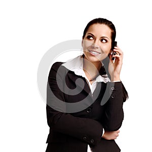 Attractive young woman calling by cellular phone.