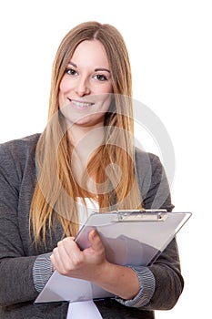 Attractive young woman with clipboard