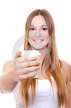 Attractive young woman with coffee to go