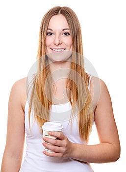 Attractive young woman with coffee to go
