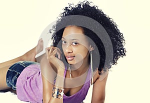 Attractive young woman with curtly frizzy long hair