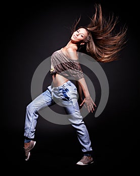 Attractive young woman dancing,