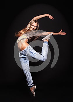 Attractive young woman dancing,