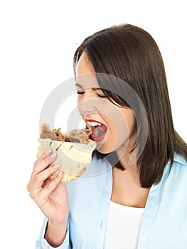 Attractive Young Woman Eating a Donner Kebab