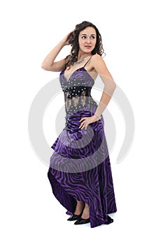 Attractive young woman in elegant purple dress