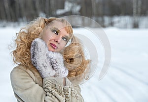 Attractive young woman with exaggerated cilia photo