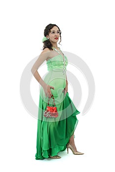Attractive young woman in green dress