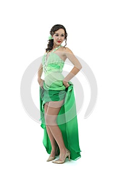 Attractive young woman in green dress