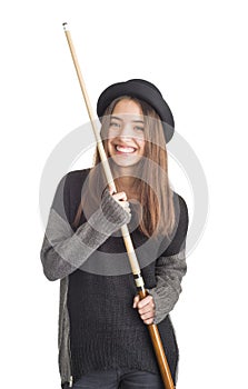 Attractive young woman holding billiard cue