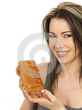 Attractive Young Woman Holding a Hot Cheese Slice Pastry