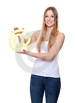 Attractive young woman holding at sign