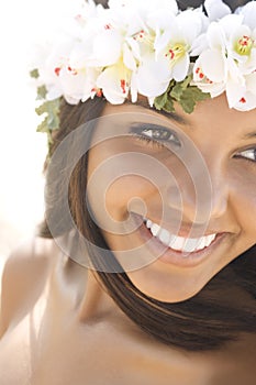 Attractive Young Woman in Lei Smiling