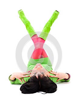 Attractive young woman lies on a white background