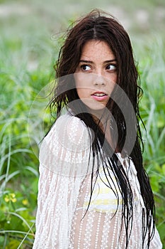 Attractive Young Woman Looking Over Her Shoulder