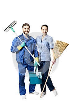 Attractive young woman and man in cleaning uniform and rubber gloves holding a broom cleaning products in his hands, isolated on