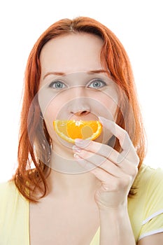 Attractive young woman with oranges