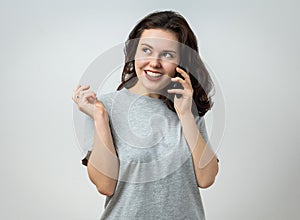 Attractive young woman on the phone