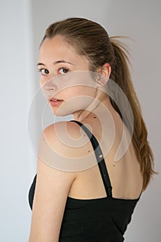 Attractive young woman posing in studio
