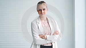 Attractive young woman profile portrait in office
