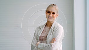 Attractive young woman profile portrait in office