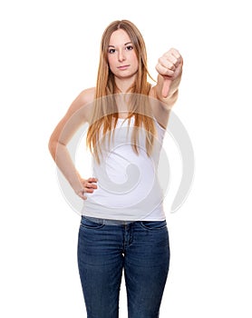 Attractive young woman showing thumbs down