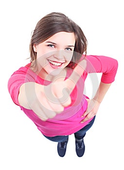 Attractive young woman showing a thumbs up