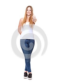 Attractive young woman showing thumbs up