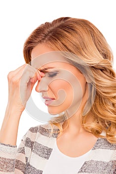 Attractive young woman suffering of strong headache