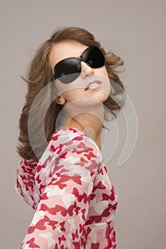 Attractive young woman with sunglasses