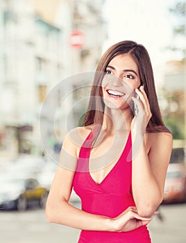 Attractive young woman talking on the mobile phone