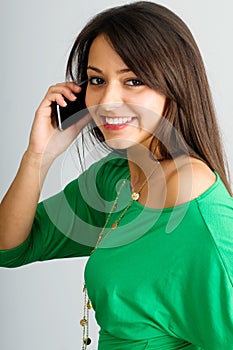 Attractive young woman using phone headset