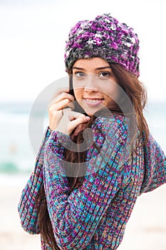 Attractive Young Woman Wearing a Sweater and Knit