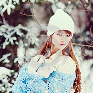 Attractive young woman in wintertime outdoor