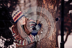 Attractive young woman in wintertime outdoor