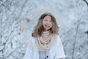 Attractive young woman in wintertime outdoor