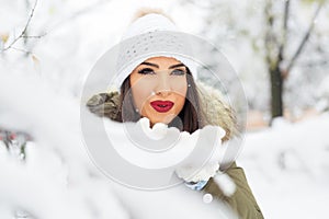 Attractive young woman in wintertime outdoor