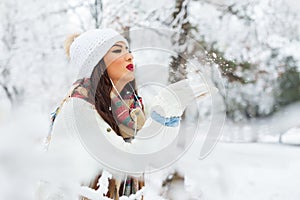 Attractive young woman in wintertime outdoor