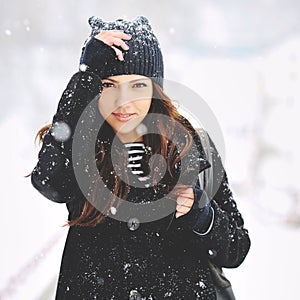 Attractive young woman in wintertime outdoor