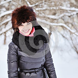 Attractive young woman in wintertime outdoor