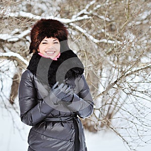 Attractive young woman in wintertime outdoor