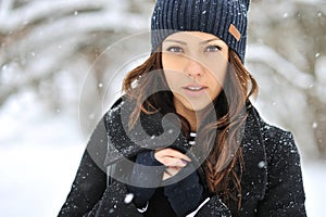 Attractive young woman in wintertime outdoor