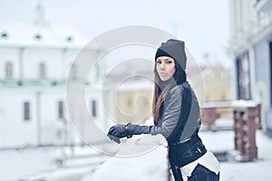 Attractive young woman in wintertime outdoor